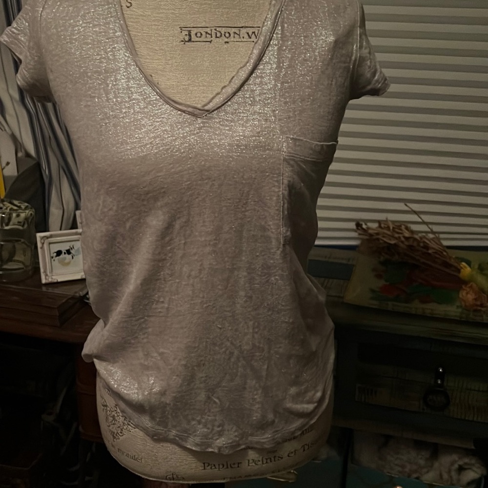 Neutral but shiny top